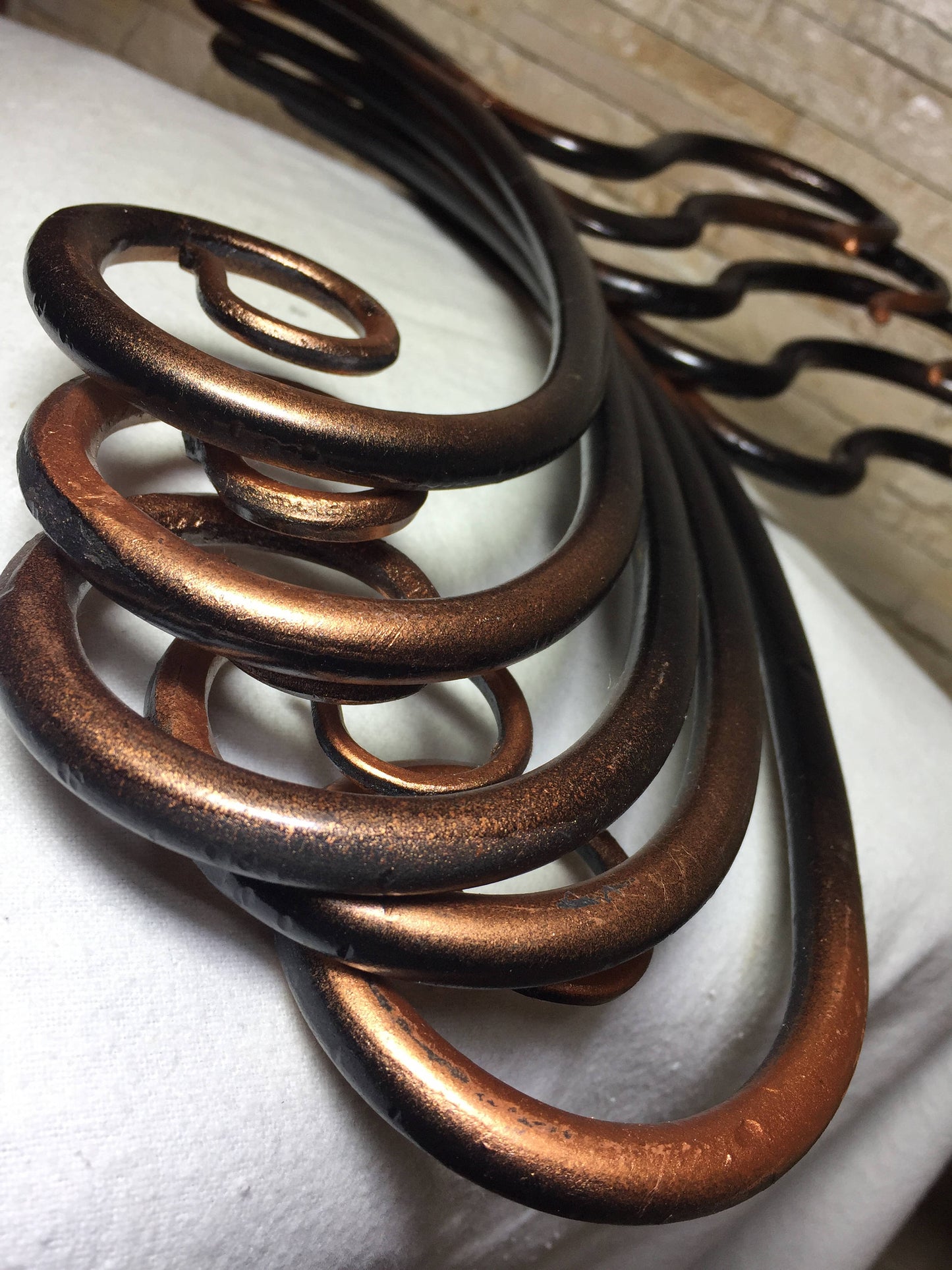 Set of 3 hangers, hand forged