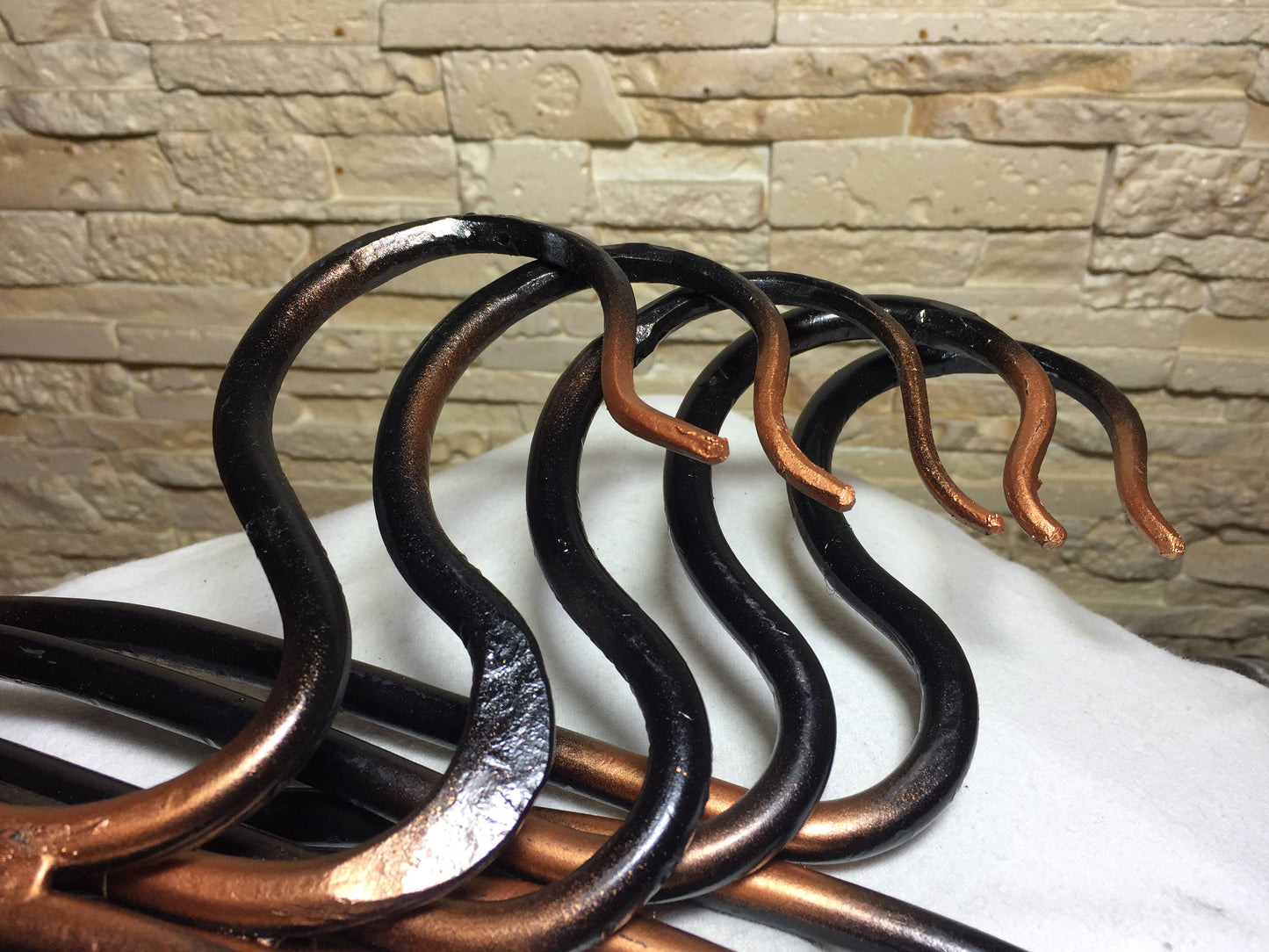 Set of 3 hangers, hand forged