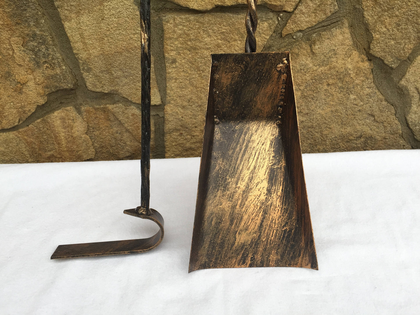 A set of fire tools, fire poker, hand forged shovel, hand forged fire poker, fireplace, fireside, wrought iron poker, log burner, hearth