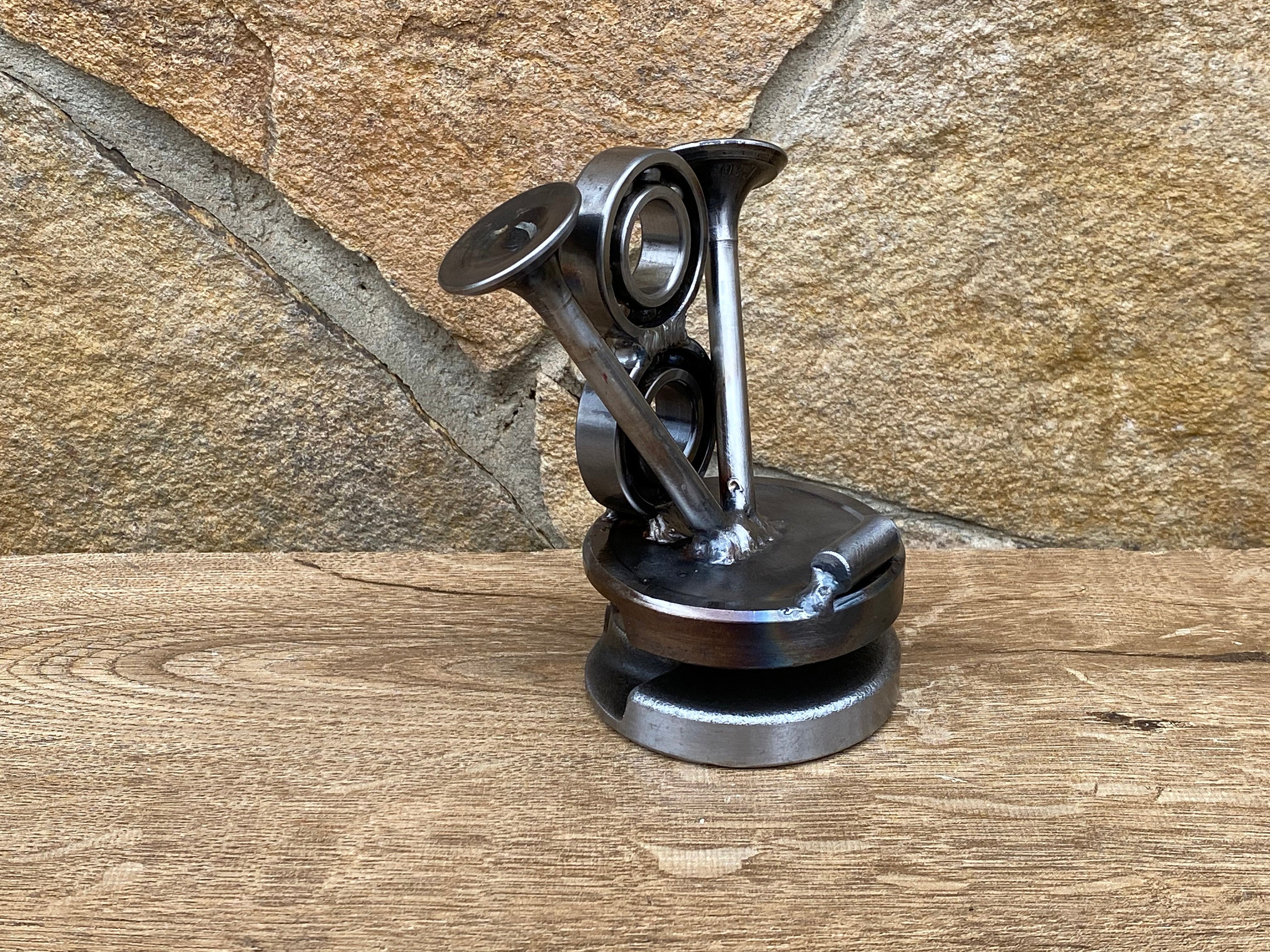 Hand forged store phone stand